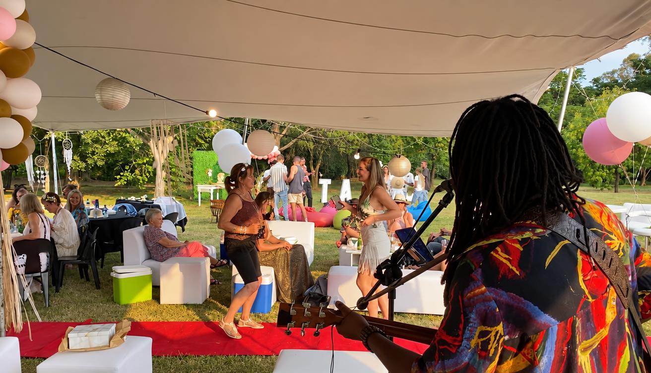 A singer performing at a garden celebration