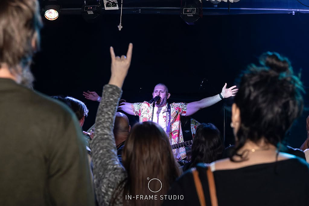 Live singer performing with the crowd